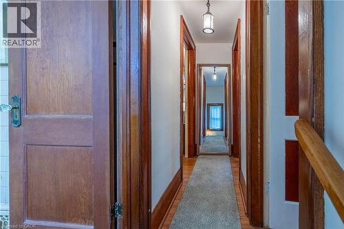 Upstairs hall with original wood trim, doors and baseboards - 72 Crescent Boulevard, Simcoe, ON - Indoor Photo Showing Other Room