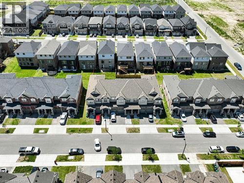 Aerial perspective showcasing a collection of residential properties - 76 Grassbourne Avenue, Kitchener, ON 