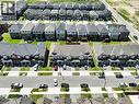 Aerial perspective showcasing a collection of residential properties - 76 Grassbourne Avenue, Kitchener, ON 