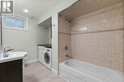 Unit 2 - Lower Level Bathroom & Laundry - 