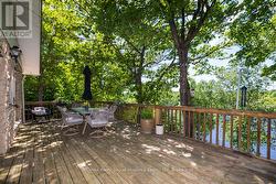 Enjoy lakeside dining in the shade of mature trees - 