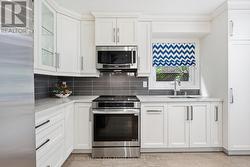 Renovated Kitchen Showcases Quartz Countertops - 