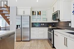 The Renovated Kitchen Features S/S Appliances - 