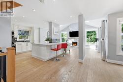 Engineered Hardwood Flooring T/O the Main Level - 