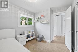 Second Bedroom with Engineered Hardwood Flooring - 