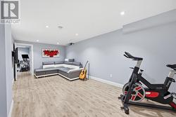 Laminate Flooring Throughout Recreation Room - 