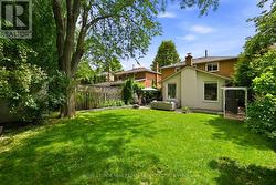 Backyard Offers Mature Trees & Established Gardens - 