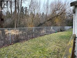Green space with the creek in the background - 