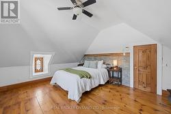 Primary bedroom with beautiful exposed stone walls - 
