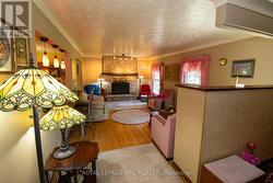 Large living room with gas fireplace - 