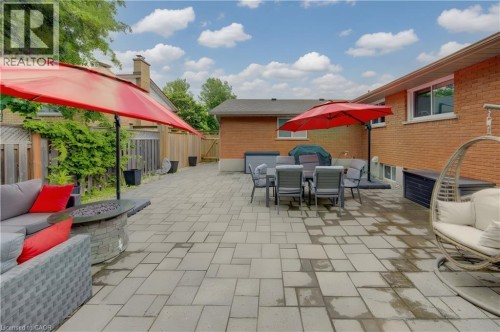 Expansive paver patio offering significant outdoor living space - 127 Strathcona Crescent, Kitchener, ON 