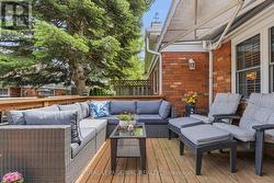Deck off Sunroom with Automatic Awning - 