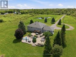 Aerial home view with garage and acreage - 