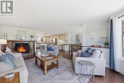 Cozy fireplace lounge in open main floor - 