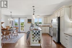 Kitchen island with breakfast bar seating - 