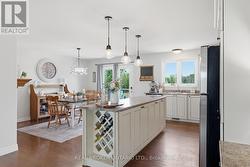 Dining area beside bright  kitchen - 