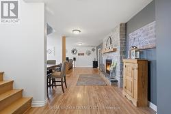 Finished basement rec room with fireplace - 