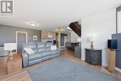 Basement lounge with seating area - 