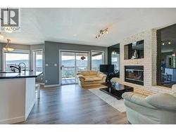Family room with gas fireplace and access to covered deck - 