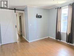Main Floor Primary Bedroom - 
