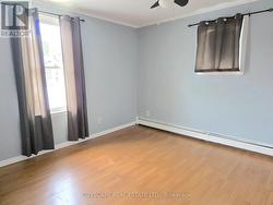 Main Floor Primary Bedroom - 