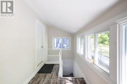 Mudroom with stairs to unfinished basement - 