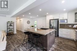 ...S.S. appliances, lots of cabinetry storage... - 