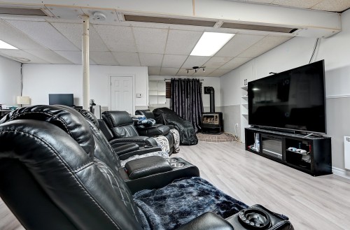 Salle familiale - 7811 Ch. Des Roy, Saint-Damien, QC - Indoor Photo Showing Garage