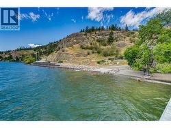 Public boat launch adjacent to shared private lake lot. - 