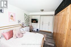 Bedroom wall can be removed to enlarge family room - 