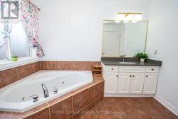 Upstairs 4 piece bath with closet w/laundry hookup - 