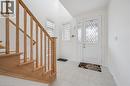 Entryway featuring a decorative glass front door, side panel, and two windows with blinds - 153 Rivertrail Avenue, Kitchener, ON  - Indoor Photo Showing Other Room 