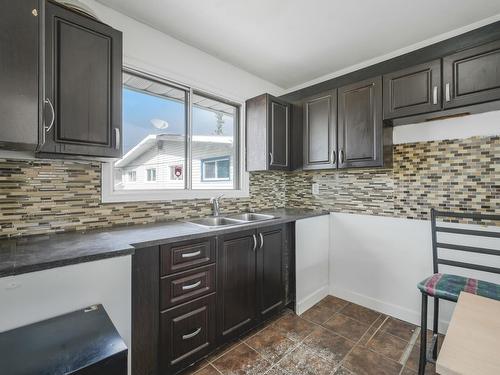Edmonton, Alberta - Indoor Photo Showing Kitchen With Double Sink