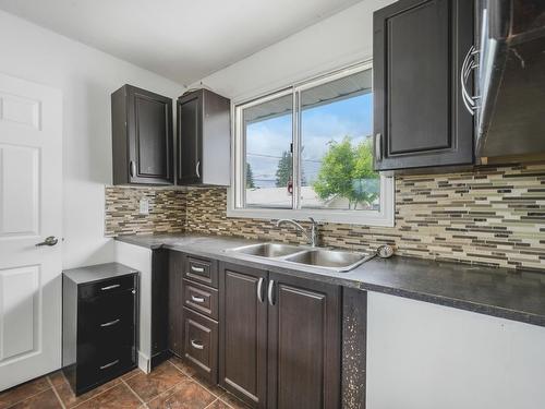 Edmonton, Alberta - Indoor Photo Showing Kitchen With Double Sink