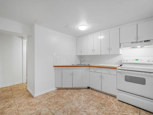 Edmonton, Alberta - Indoor Photo Showing Kitchen With Double Sink