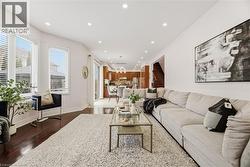 Living area featuring recessed lighting and wood-type flooring - 