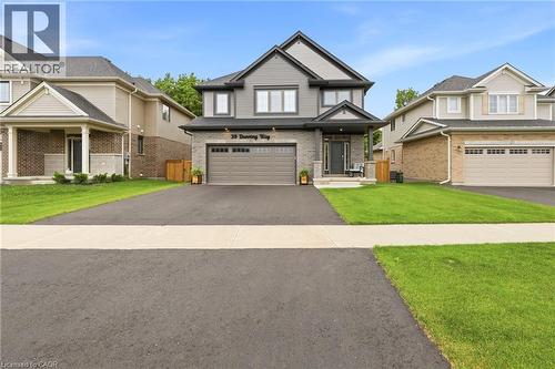 Contemporary two-story residence featuring a gray siding and brick facade - 39 Dunning Way, St. Thomas, ON 