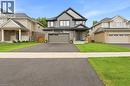 Contemporary two-story residence featuring a gray siding and brick facade - 39 Dunning Way, St. Thomas, ON 