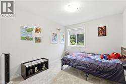 White walls with a window featuring a roller shade - 