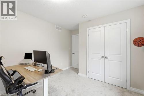 Neutral-toned walls complement the light-colored carpeting - 39 Dunning Way, St. Thomas, ON 