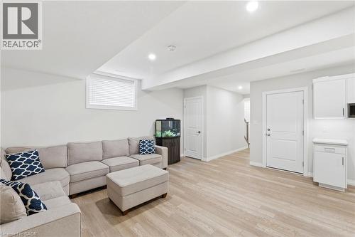 Finished lower level featuring light wood-finish flooring - 39 Dunning Way, St. Thomas, ON 