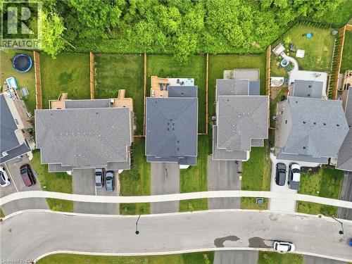 Aerial perspective showcasing residential properties with asphalt shingle roofs and private backyards - 39 Dunning Way, St. Thomas, ON 