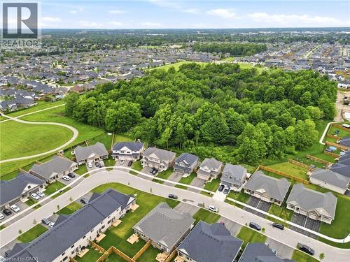 Aerial perspective of a residential neighborhood featuring detached homes and townhomes - 39 Dunning Way, St. Thomas, ON 
