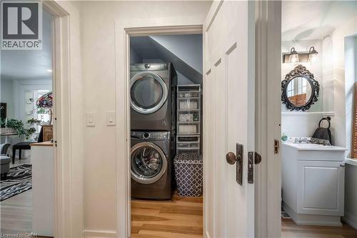 View of laundry/bath perspective from hallway. - 99 Argyle Street N, Caledonia, ON 