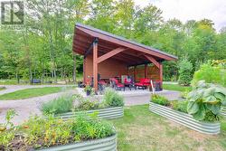 Covered Pavilion & Raised Garden Beds - 