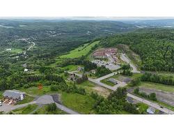 - de la Tour Edmundston, NB E3V 0H7