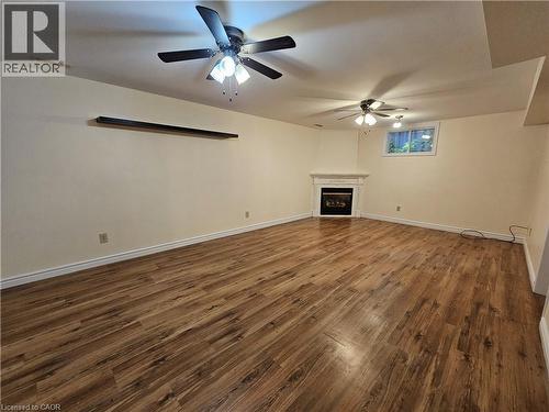 Family Room in basement with gas fireplace - 120 Lynndale Road, Simcoe, ON 