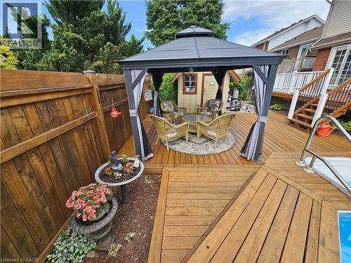 Multi-tier deck with manicured gardens and gazebo - 120 Lynndale Road, Simcoe, ON 