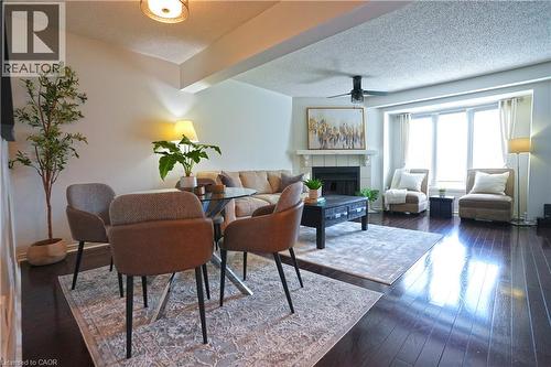 3140 Fifth Line W Unit# 28, Mississauga, ON - Indoor Photo Showing Living Room With Fireplace