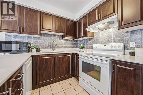 3140 Fifth Line W Unit# 28, Mississauga, ON - Indoor Photo Showing Kitchen With Double Sink